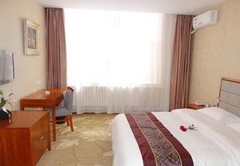 Yuangu Town Business Hotel Циндао Экстерьер фото
