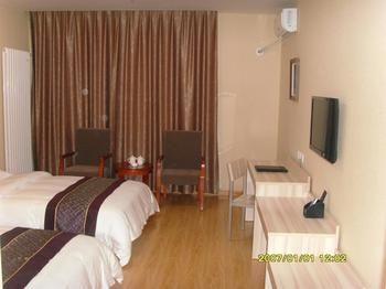 Yuangu Town Business Hotel Циндао Экстерьер фото